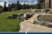 Steps and retaining wall of a sloped landscape