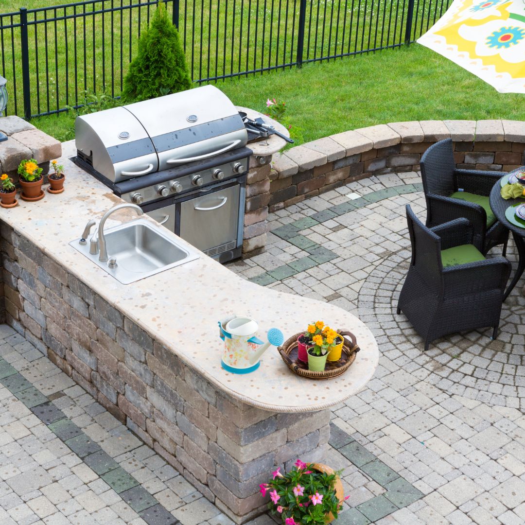 outdoor kitchen with counter and grill