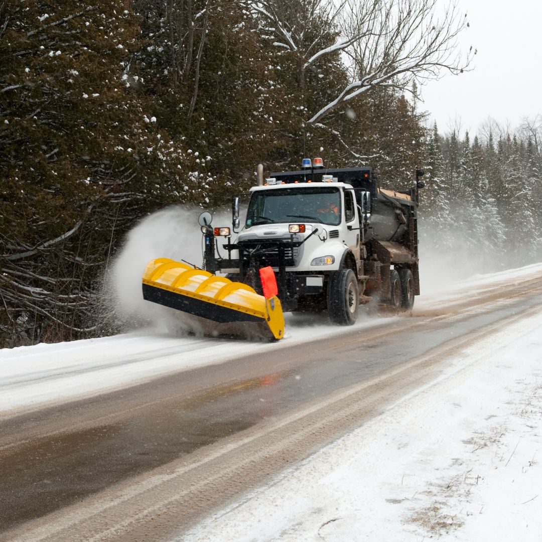 large snow plow on street